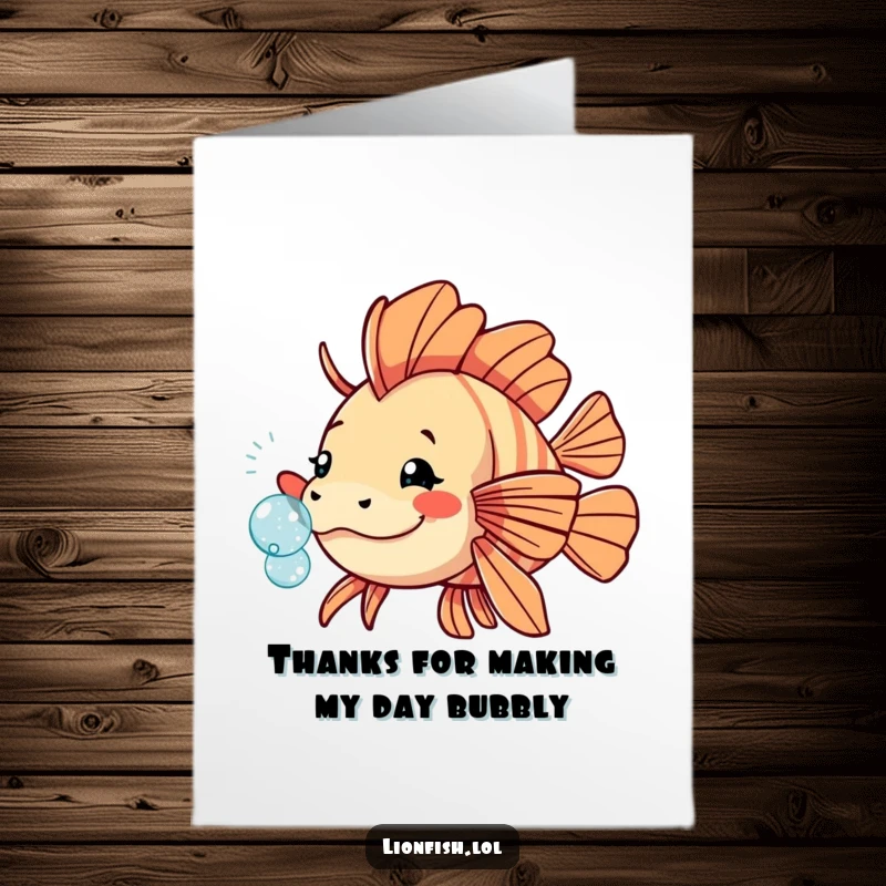 Funny free printable thank you card: a playful lionfish nudging a sparkling bubble, offering thanks with a lighthearted underwater touch.